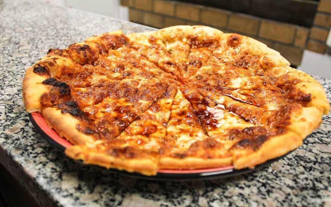 La calle de La Noria da la bienvenida a La Casa de la Pizza